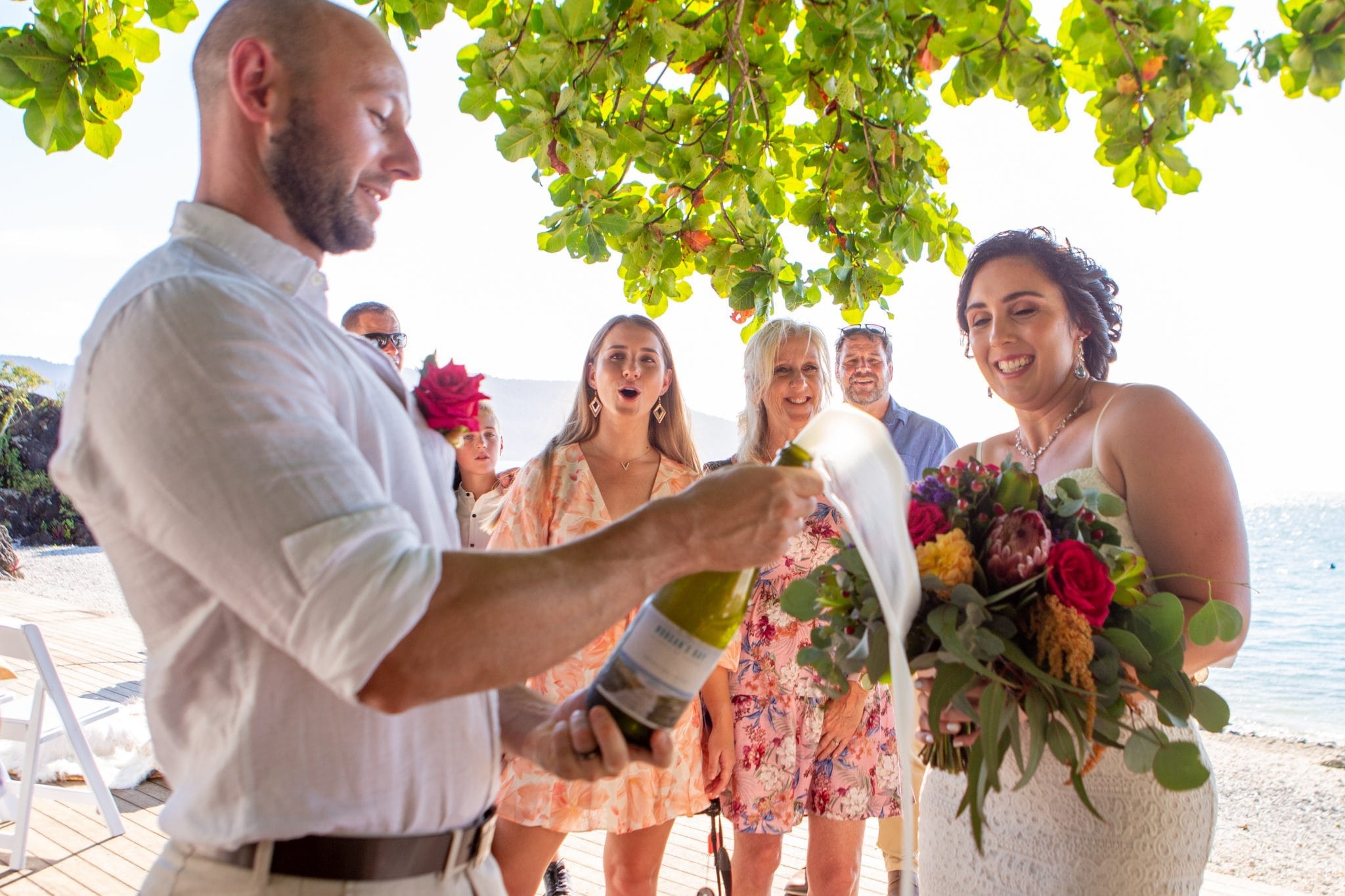 Groom popping champainge